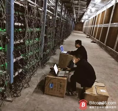 A large mining farm filled with rows of mining rigs.