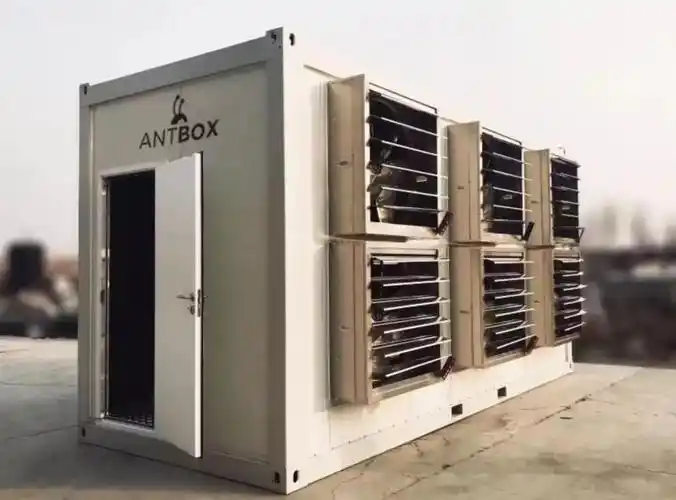 A wide shot of a large mining farm with rows of ASIC miners.